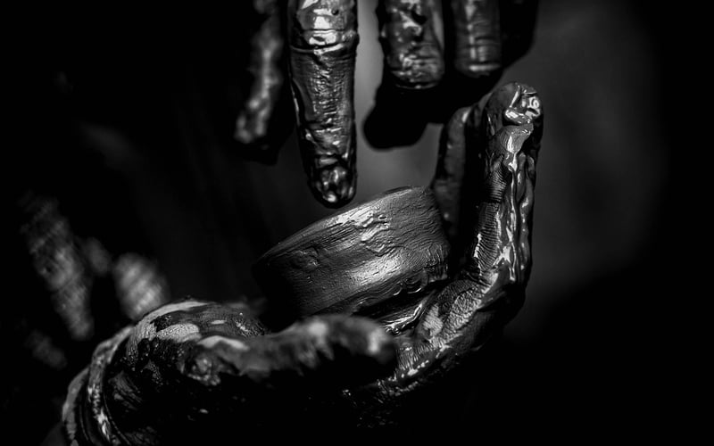 Hands Typing on Laptop